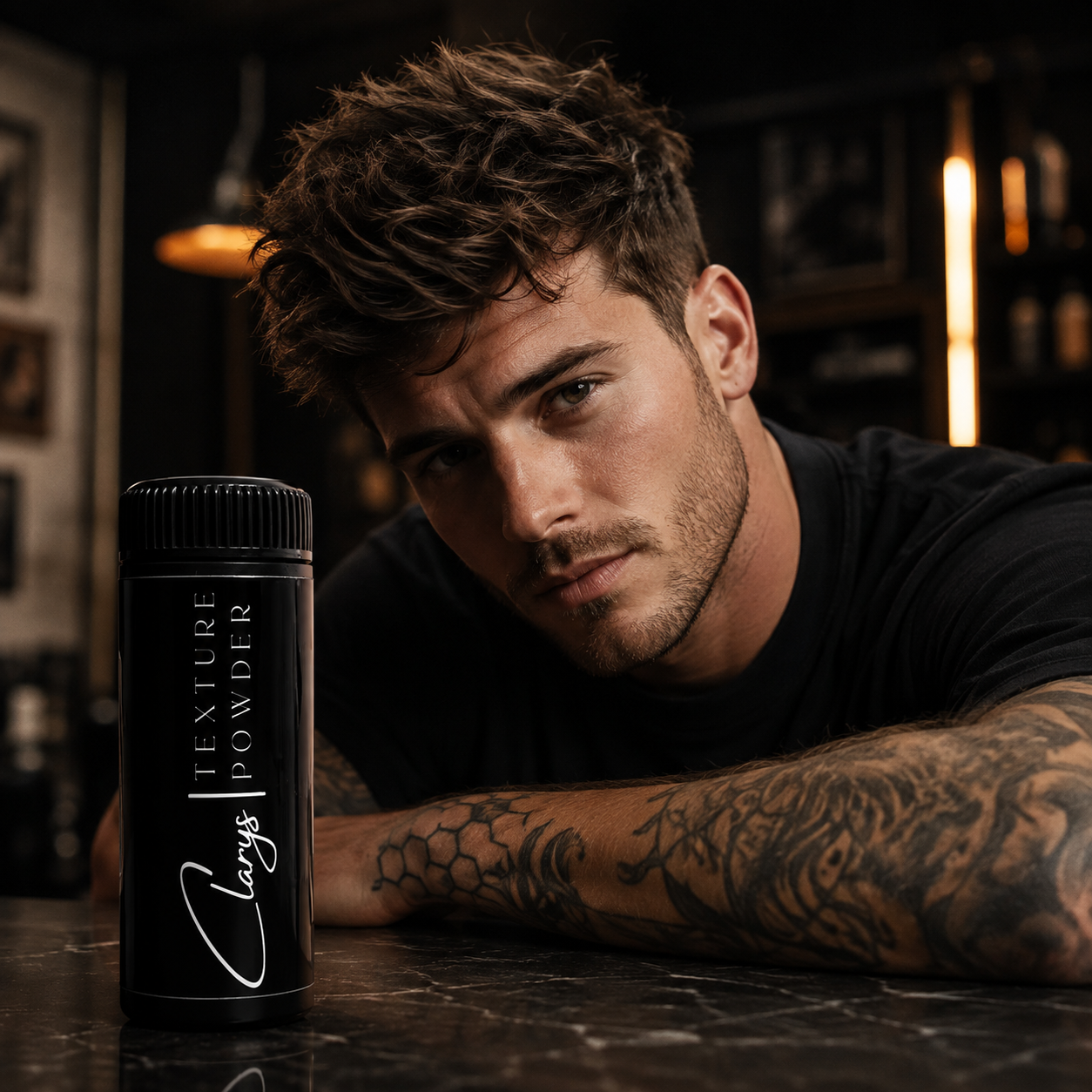 Man with a messy textured crop next to Clary's Texture Powder hair styling powder for men